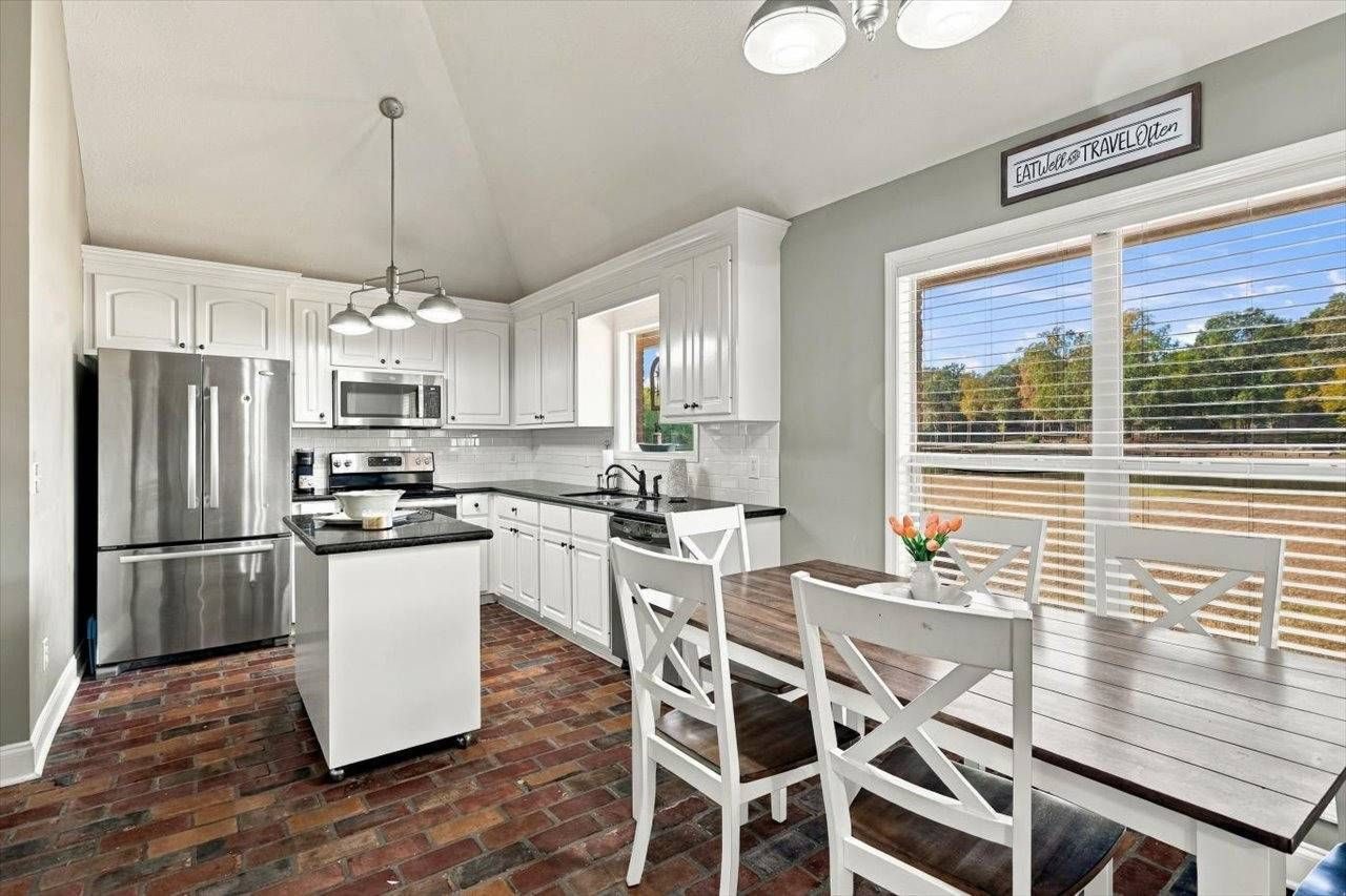 Kitchen and dining area with island